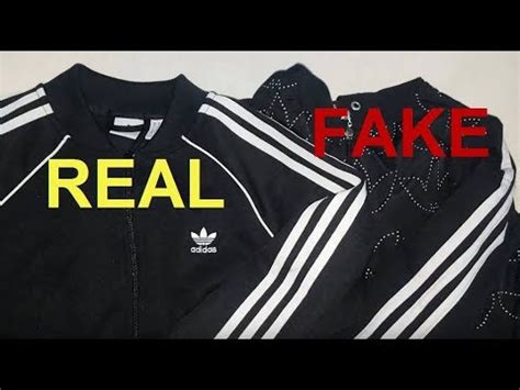 fake adidas hoodie vs real|adidas zip up jacket real.